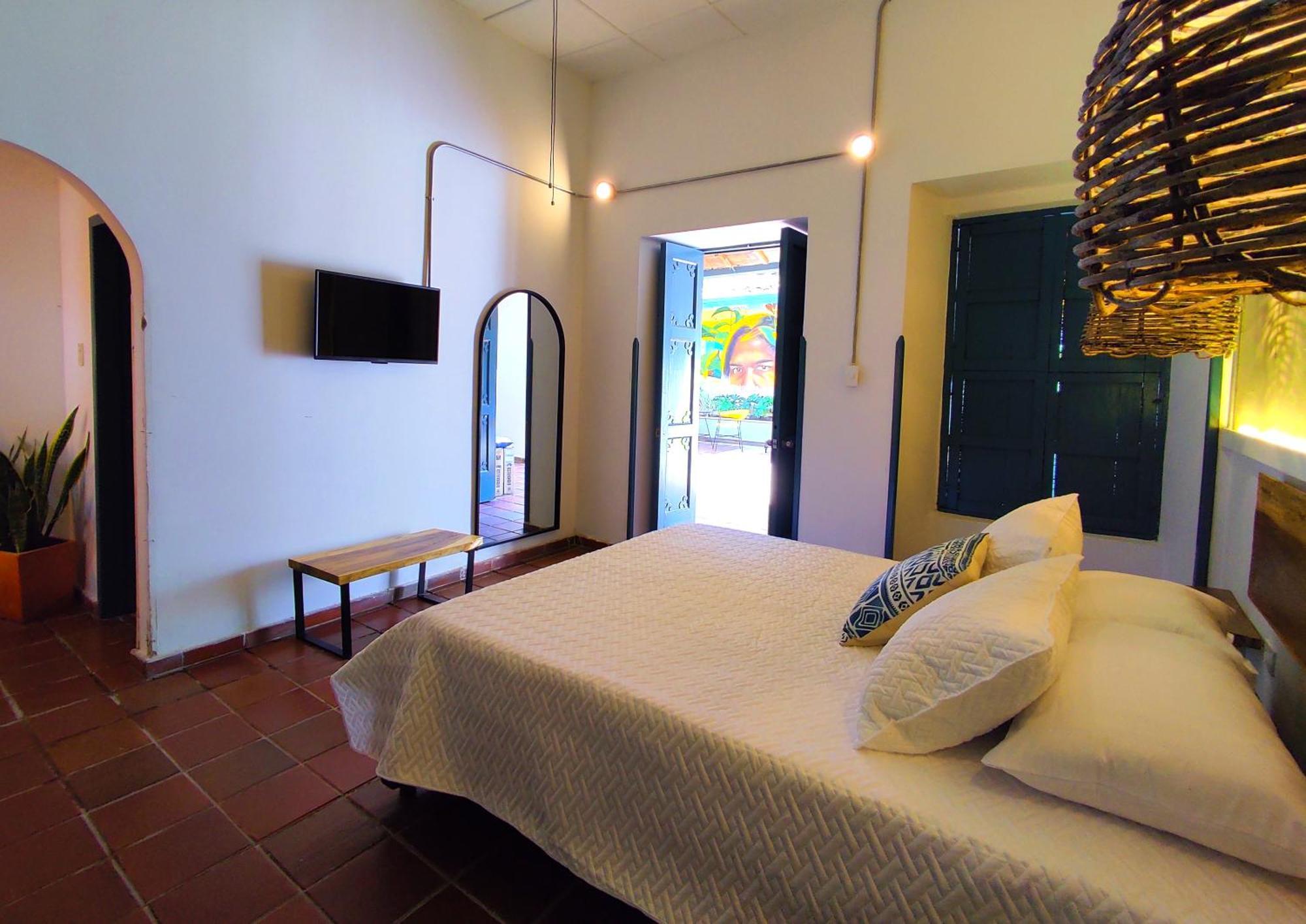 Trip Monkey Giron Hotell Rum bild