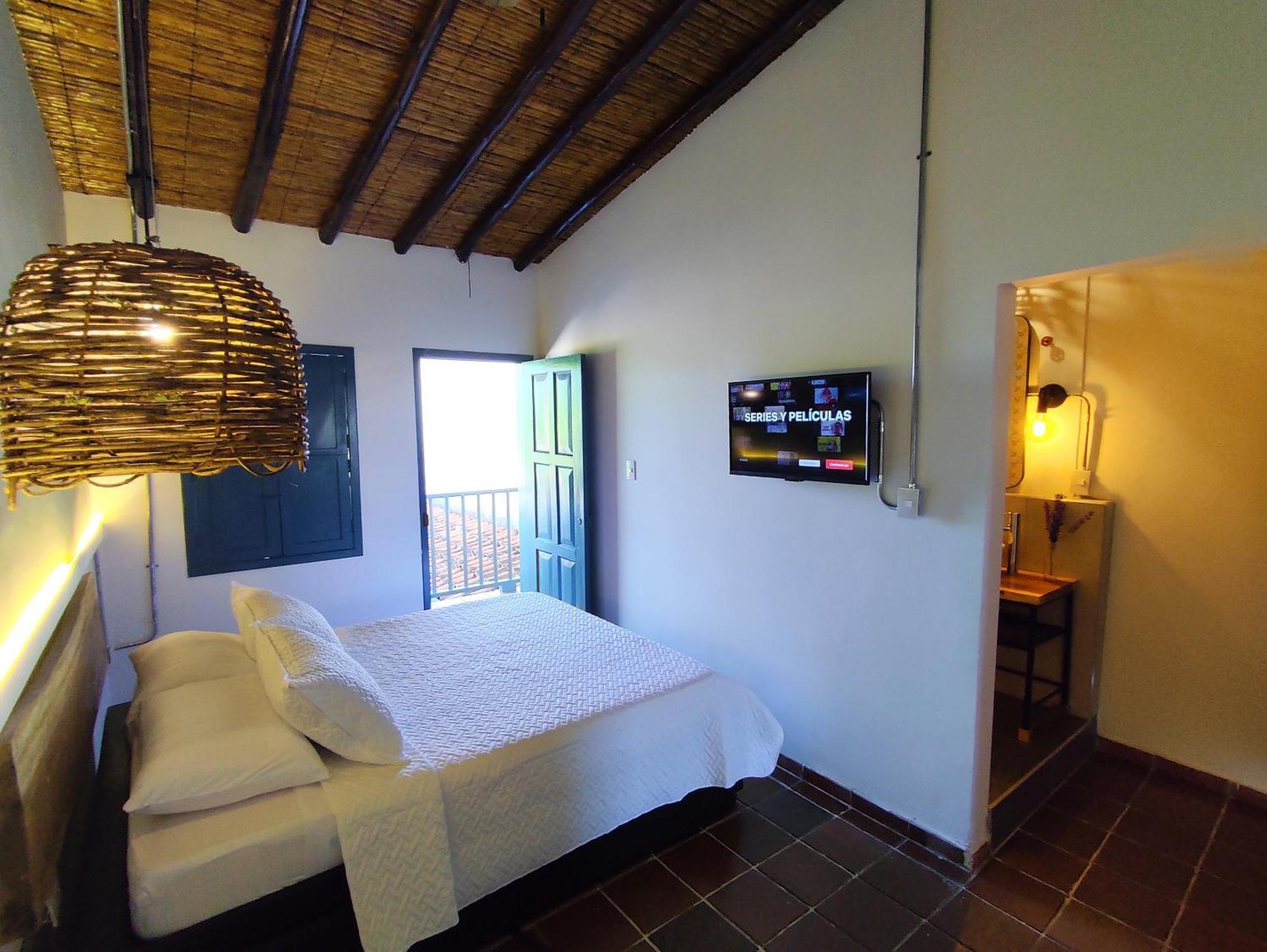 Trip Monkey Giron Hotell Rum bild